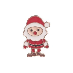 Macro detail of cartoon Santa Claus enamel brooch pin with classic red and white colors