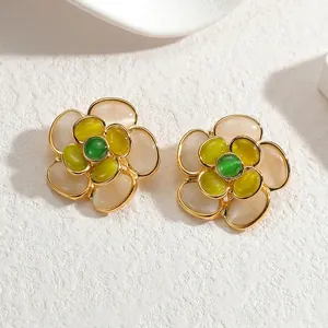 18K gold plated stainless steel floral earrings with green stone and cat-eye petals