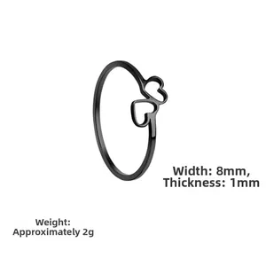 Detail view of 8mm wide black stainless steel ring with hollow heart design and dimensions