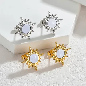 Minimalist stainless steel starburst sun earrings in gold and silver finishes