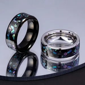8mm Galaxy Series Galaxy Opal Rings in black and silver finishes on mirror surface