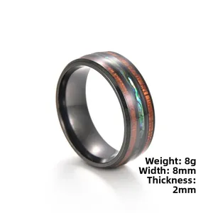 Detail view of 8mm vintage titanium steel ring with wood inlay and abalone shell inlay