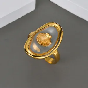 Minimalist gold stainless steel open ring with oval shell inlay and adjustable band