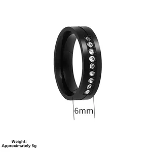 Detail view of 6mm black stainless steel ring featuring vertical sparkling crystals inlay