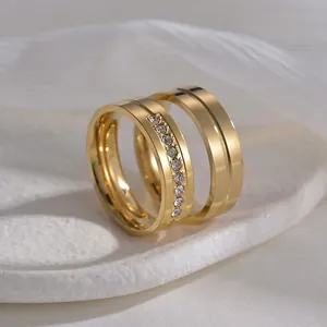 Matching pair of 6mm gold plated stainless steel couple rings with crystals