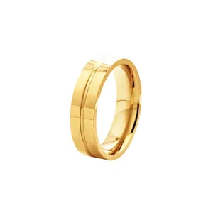 Detailed view of 6mm gold stainless steel ring featuring a polished finish and center groove