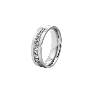 Macro detail of 6mm stainless steel band featuring a row of sparkling inset cubic zirconia