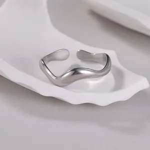 Minimalist irregular wavy open ring in polished silver finish made of durable titanium steel
