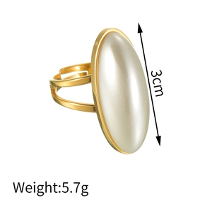 Detail view of gold adjustable ring with oval white pearl, height 3cm and weight 5.7g