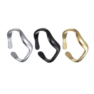 Set of three irregular wave open rings in silver, black, and gold polished stainless steel