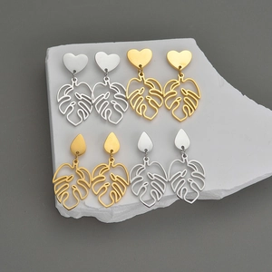 Minimalist stainless steel monstera leaf drop earrings in gold and silver finish set