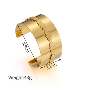 Detail view of 18K gold plated wide cuff bracelet showing 5.9cm inner diameter and 3.1cm width