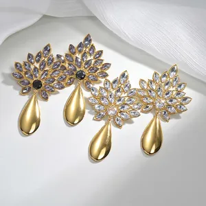 Elegant 18K gold-plated stainless steel sunflower earrings with sparkling teardrop crystals