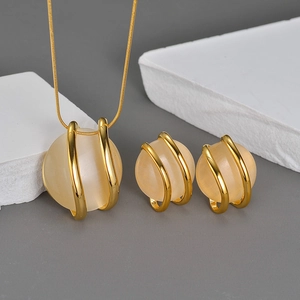 Minimalist stainless steel jewelry set with gold round pendant necklace and stud earrings