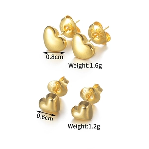 Detail view of heart-shaped stainless steel studs with size and weight specifications