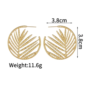 Detailed view of 3.8cm gold stainless steel hoop earrings with hollow palm leaf pattern