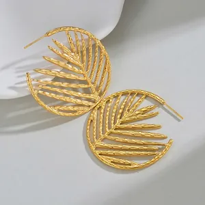 Exaggerated 18K gold plated stainless steel hollow leaf hoop earrings for women