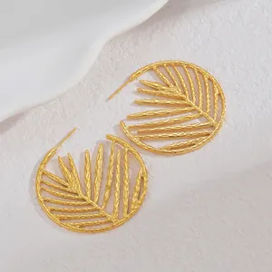 Chic 18K gold-plated stainless steel hoop earrings with cutout palm leaf design