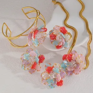 Elegant floral stainless steel jewelry set with colorful enamel petals and crystals