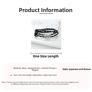 Macro detail of adjustable magnetic couple bracelets with braided cords and alloy charms