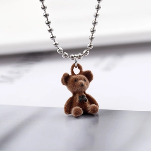 Cute brown flocked bear pendant necklace with a polished silver metal bead chain