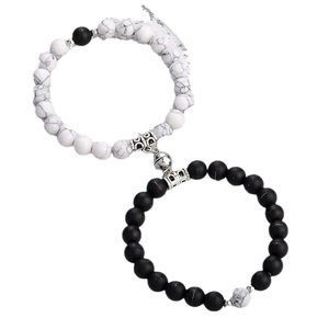 Magnetic couple bracelets with white marble and matte black beads in infinity shape