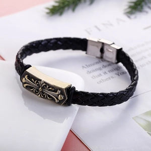Men's vintage braided leather bracelet with bronze cross plaque and steel clasp