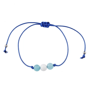 Handmade blue woven cord bracelet with cat eye beads and adjustable sliding knot