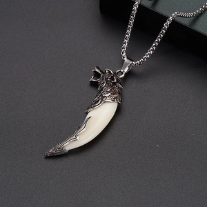 Detailed view of rock hip-hop stainless steel necklace with wolf head and tooth pendant