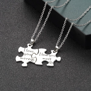 Passende Puzzle-Halsketten für Paare mit I love you more und most Gravuren