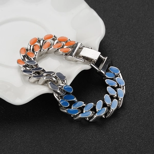 Punk style Cuban link bracelet with tricolor enamel drip in orange and blue on silver metal