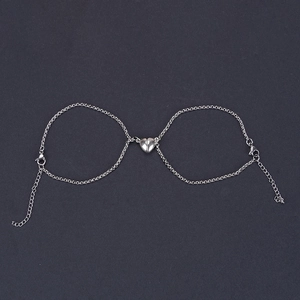 Minimalist magnetic couple bracelets with polished heart charms and adjustable chains