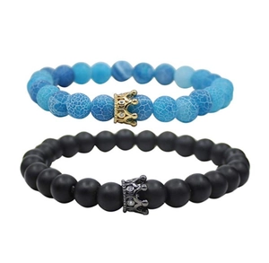 Detail of 8mm weathered agate bead bracelets featuring gold and silver crowns with zircons