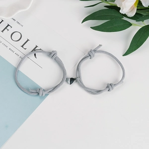 Magnetic matching heart couple bracelets with grey braided rope and adjustable knots