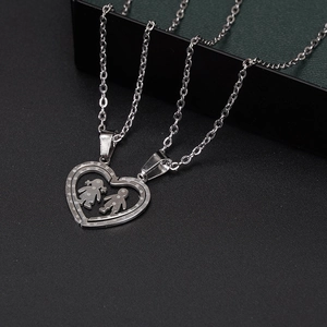 Minimalist silver-toned stainless steel couple necklaces with heart puzzle pendants