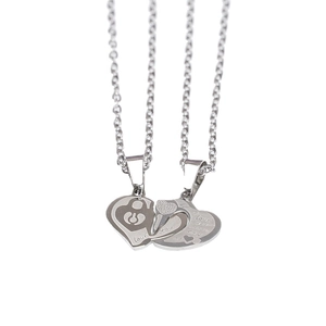 Couples titanium steel heart pendant necklace set with Love You engraving on white background
