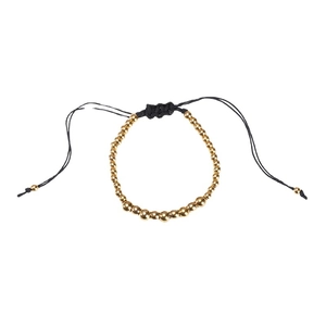 Handmade woven cord bracelet with gold beads and adjustable slider closure for couples