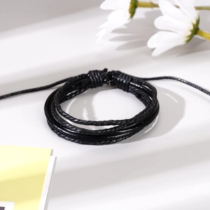 Handmade woven leather men's bracelet with multi-layer black cord and adjustable slide knot