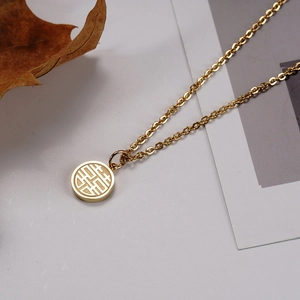 Detailed close-up of 18K gold plated titanium necklace featuring a Fu Xi wedding pendant