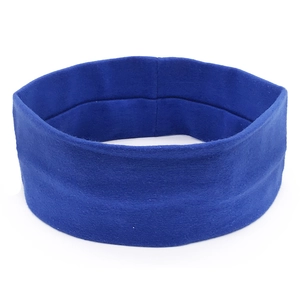 Close-up of deep blue elastic sports headband showing breathable knitted fabric texture