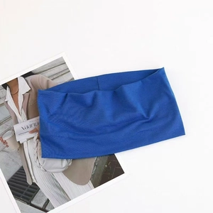 Detail of royal blue elastic yoga headband featuring premium knitted fabric texture