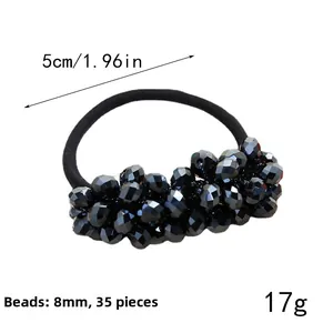 Detail showing 8mm black faceted beads and 5cm diameter of this elastic hair tie