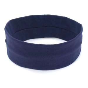Detailed texture of dark blue elastic sports headband for yoga and running hair styling