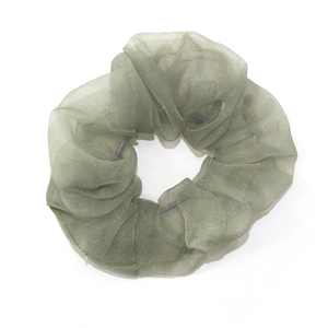Elegant bean paste green sheer organza scrunchie with subtle shimmer for women's hair