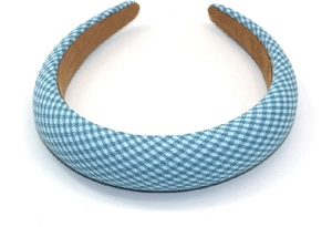 Detail view of blue gingham headband showing wide sponge padding and brown non-slip lining