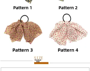Detailed view of floral chiffon bow hair ties with high elastic black rubber bands