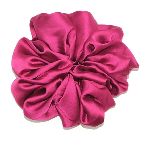 Elegant oversized rose pink satin scrunchie with a soft silk sheen and rich pleats