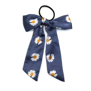 Navy blue daisy print bow hair tie with high elastic band and satin ribbon finish