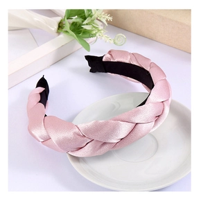 Detail of the light pink braided satin headband with non-slip black inner lining