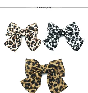 Lot de trois barrettes à cheveux à nœuds surdimensionnés avec imprimé léopard chic